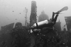 Diver explores the wreck of the Antilla. Nikonos V, 20mm ... by Matthew Shanley 